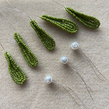 Load image into Gallery viewer, Close-up of beaded mistletoe leaves and white glass pearl berries.