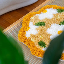 Load image into Gallery viewer, Delightful Daisies latch hook rug styled in a bedroom.