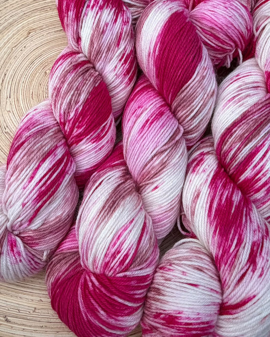 Hand Dyed Sock 4ply Yarn in Raspberry Ripple by Solicious Yarns