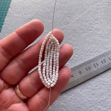 Load image into Gallery viewer, Illustrated step-by-step instructions from the lily beaded flower kit.