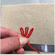 Load image into Gallery viewer, Poppy beaded flower craft kit by The Beaded Garden in its packaging.