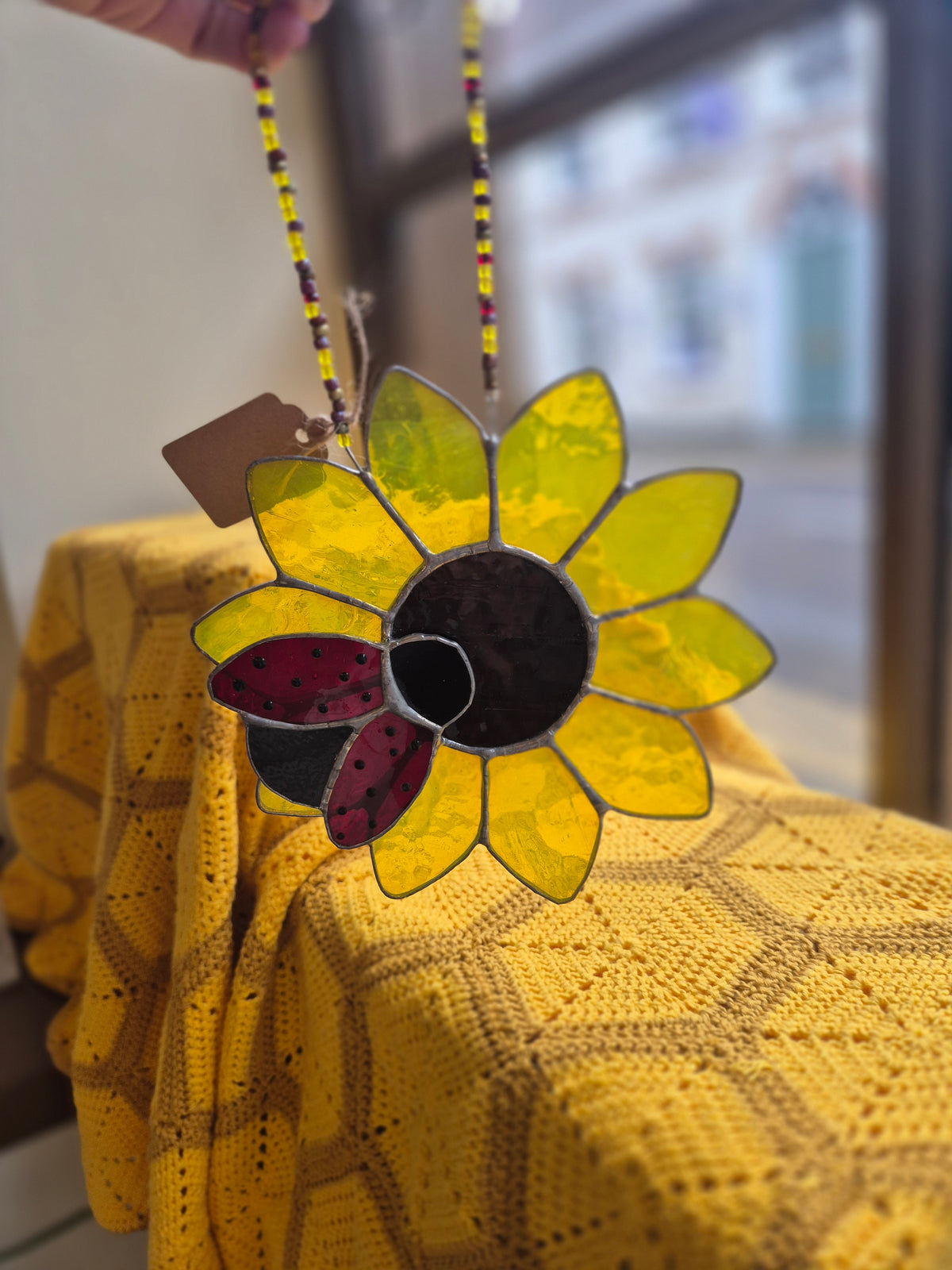 Sunflower and ladybird stained glass suncatcher by Gobblin Glass