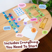 Load image into Gallery viewer, Contents of the Tiny Treasures diamond painting kit: adhesive frame, gems, applicator, tray and gold stand.