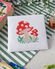 Load image into Gallery viewer, Finished red toadstool mini cross stitch by The Make Arcade.