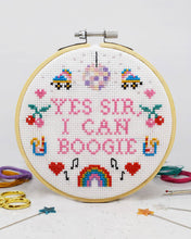 Load image into Gallery viewer, Finished disco cross stitch with mirrorball and rollerskate in a wooden hoop by The Make Arcade.