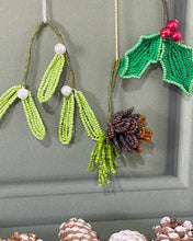 Load image into Gallery viewer, Beaded holly, mistletoe and pinecone Christmas decorations by The Beaded Garden.
