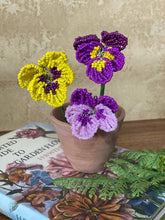 Load image into Gallery viewer, Handmade beaded pansy flowers in yellow and purple with fern leaves
