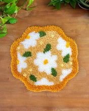 Load image into Gallery viewer, Finished Delightful Daisies scalloped latch hook rug with white daisies on honey by Craft Club.
