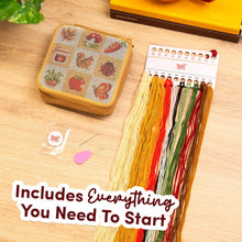 Load image into Gallery viewer, Fall Harvest Charms needlepoint pouch being stitched.
