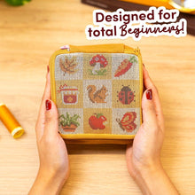 Load image into Gallery viewer, Contents of the Fall Harvest Charms needlepoint pouch kit with printed pre-sewn pouch.
