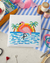 Load image into Gallery viewer, Flamingo Beach mini cross stitch kit by The Make Arcade showing a finished pink flamingo and palm trees at sunset
