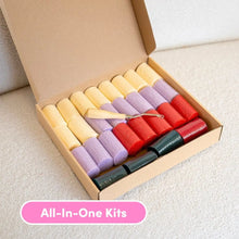 Load image into Gallery viewer, Contents of the Fuchsia Wild Blooms latch hook cushion kit: wooden hook, printed canvas and pre-cut yarn.
