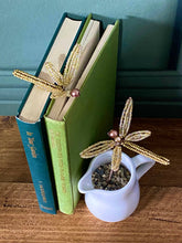 Load image into Gallery viewer, Golden dragonflies beaded craft kit in its letterbox-sized gift box.
