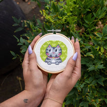 Load image into Gallery viewer, Finished kitten mini cross stitch design in a 10cm hoop.
