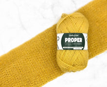Load image into Gallery viewer, Proper 4ply Shetland and Bluefaced Leicester Yarn in Cocker Yellow by World of Wool
