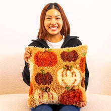 Load image into Gallery viewer, Finished Pumpkin Spice latch hook cushion with cream, rust and brown pumpkins by Craft Club.

