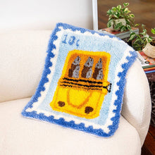 Load image into Gallery viewer, Finished Sardine Stamp latch hook rug with a blue sardine tin design by Craft Club.
