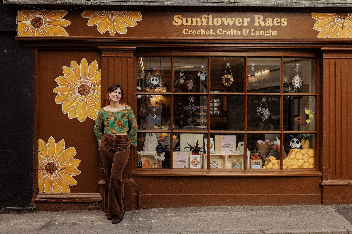 The Sunflower Raes shopfront with painted sunflowers