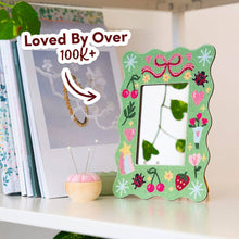 Load image into Gallery viewer, Close-up of sparkling diamond painting gems on the Tiny Treasures frame.
