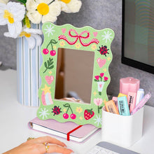 Load image into Gallery viewer, Tiny Treasures diamond painting mirror frame styled on a dressing table.
