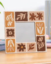 Load image into Gallery viewer, Finished Tuscan Tiles diamond painting mirror frame with a neutral abstract floral mosaic in cream, tan and brown
